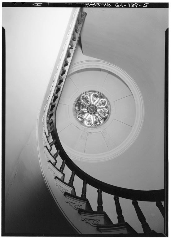 Looking up the spiral staircase at the Mercer House, with the glass dome skylight in the center of the photo